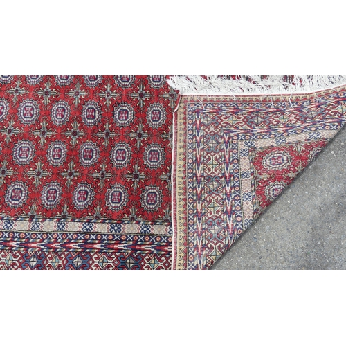 559 - Tribal Rugs; a good finely knotted Caucasian Bokhara design carpet, short wool pile on cotton base, ... 