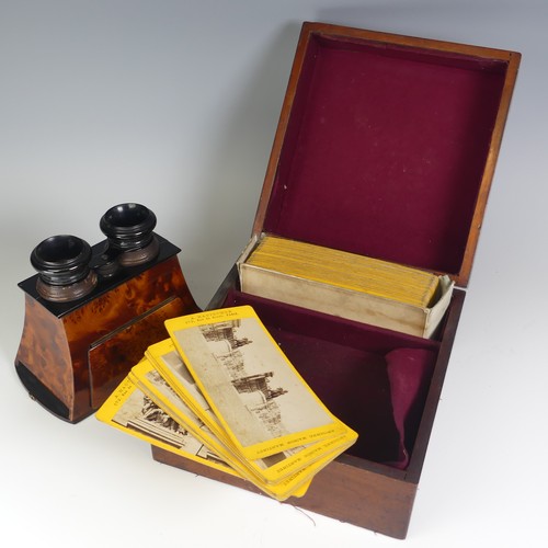 520 - A Victorian boxed burr walnut Stereoscopic Viewer, in a fitted Victorian mahogany box and with a lar... 