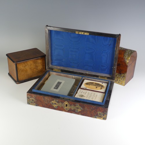 521 - A Victorian burr walnut games Box, with gilt metal mounts, the centre depicting playing cards, W 28 ... 