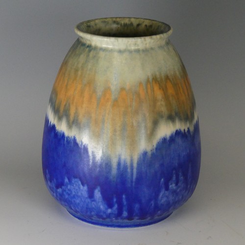 101 - A 1932 Ruskin tapered Vase, crystalline glaze of blues over light brown trickling through to a deep ... 