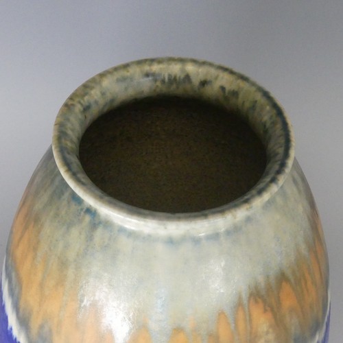 101 - A 1932 Ruskin tapered Vase, crystalline glaze of blues over light brown trickling through to a deep ... 