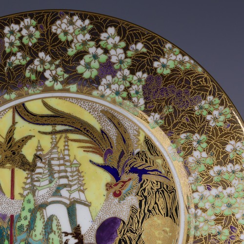 105 - Daisy Makeig-Jones for Wedgwood; a Fairyland Lustre 'White Pagodas' pattern Lincoln Plate, the well ... 