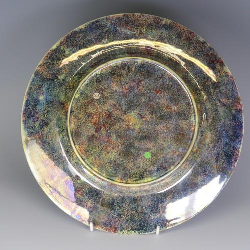 105 - Daisy Makeig-Jones for Wedgwood; a Fairyland Lustre 'White Pagodas' pattern Lincoln Plate, the well ... 