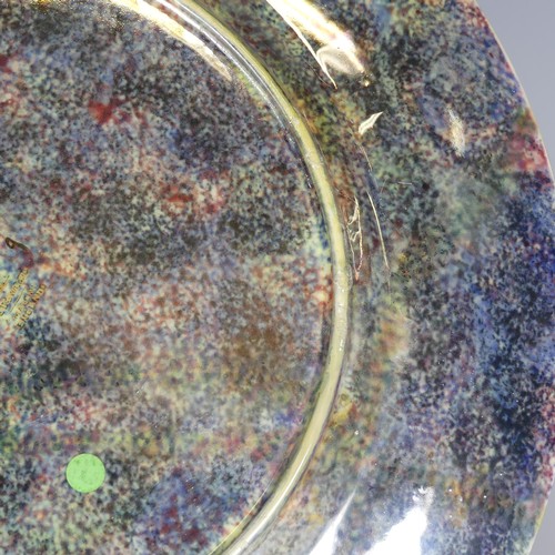 105 - Daisy Makeig-Jones for Wedgwood; a Fairyland Lustre 'White Pagodas' pattern Lincoln Plate, the well ... 