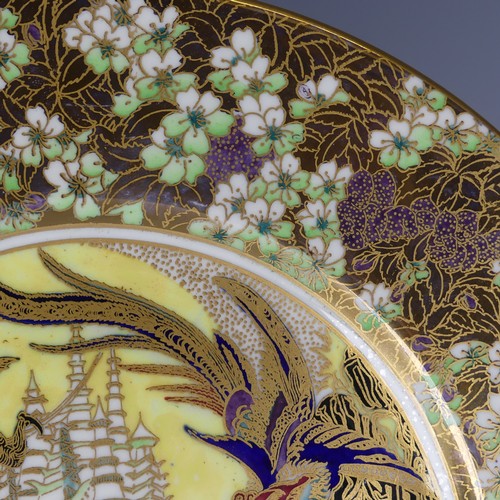 105 - Daisy Makeig-Jones for Wedgwood; a Fairyland Lustre 'White Pagodas' pattern Lincoln Plate, the well ... 