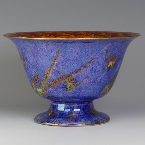 108 - Daisy Makeig-Jones for Wedgwood; a Fairyland Lustre 'Hummingbird' pattern footed Bowl, decorated to ... 