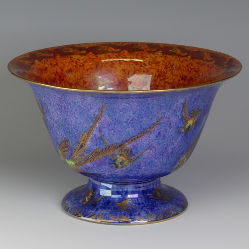 108 - Daisy Makeig-Jones for Wedgwood; a Fairyland Lustre 'Hummingbird' pattern footed Bowl, decorated to ... 