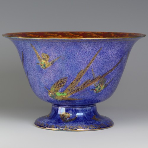 108 - Daisy Makeig-Jones for Wedgwood; a Fairyland Lustre 'Hummingbird' pattern footed Bowl, decorated to ... 