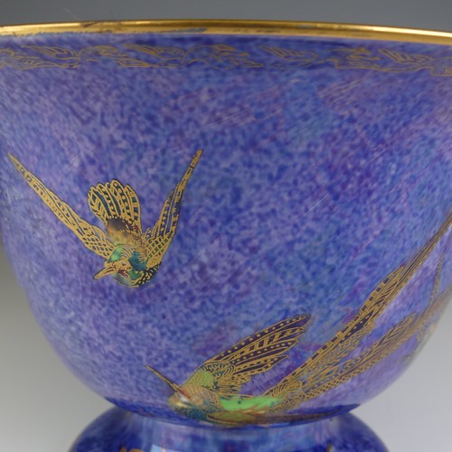 108 - Daisy Makeig-Jones for Wedgwood; a Fairyland Lustre 'Hummingbird' pattern footed Bowl, decorated to ... 