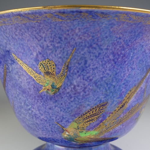 108 - Daisy Makeig-Jones for Wedgwood; a Fairyland Lustre 'Hummingbird' pattern footed Bowl, decorated to ... 