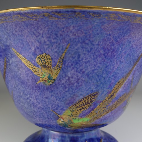 108 - Daisy Makeig-Jones for Wedgwood; a Fairyland Lustre 'Hummingbird' pattern footed Bowl, decorated to ... 