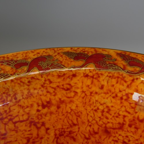 108 - Daisy Makeig-Jones for Wedgwood; a Fairyland Lustre 'Hummingbird' pattern footed Bowl, decorated to ... 