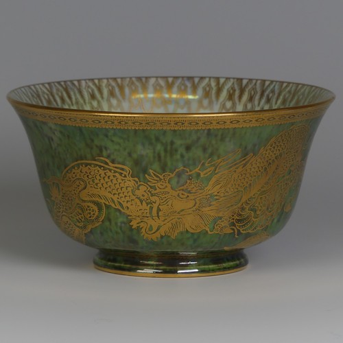 111 - Daisy Makeig-Jones for Wedgwood; a Fairyland Lustre Dragon Bowl, the interior in colours outlined in... 