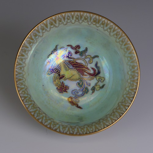 111 - Daisy Makeig-Jones for Wedgwood; a Fairyland Lustre Dragon Bowl, the interior in colours outlined in... 