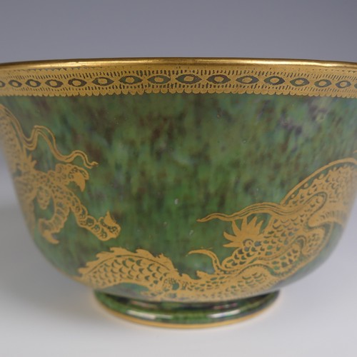 111 - Daisy Makeig-Jones for Wedgwood; a Fairyland Lustre Dragon Bowl, the interior in colours outlined in... 