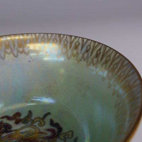 111 - Daisy Makeig-Jones for Wedgwood; a Fairyland Lustre Dragon Bowl, the interior in colours outlined in... 