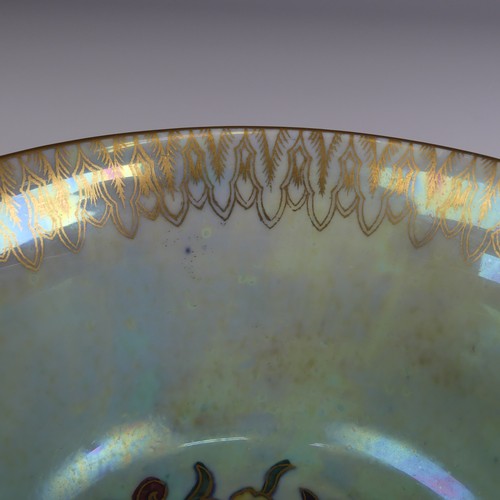 111 - Daisy Makeig-Jones for Wedgwood; a Fairyland Lustre Dragon Bowl, the interior in colours outlined in... 