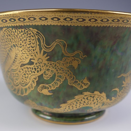 111 - Daisy Makeig-Jones for Wedgwood; a Fairyland Lustre Dragon Bowl, the interior in colours outlined in... 