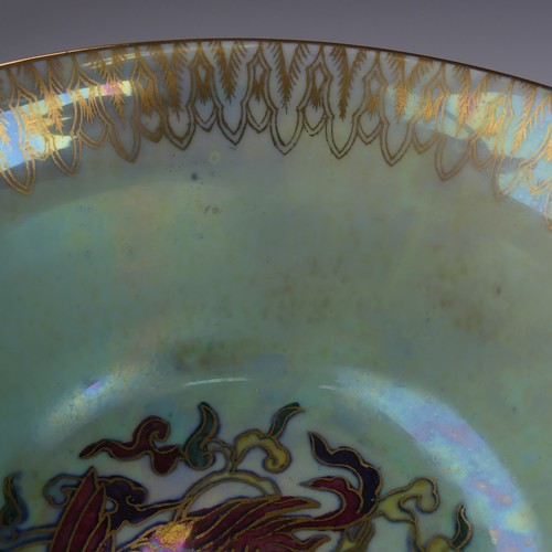 111 - Daisy Makeig-Jones for Wedgwood; a Fairyland Lustre Dragon Bowl, the interior in colours outlined in... 