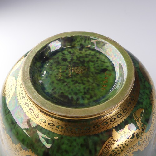 111 - Daisy Makeig-Jones for Wedgwood; a Fairyland Lustre Dragon Bowl, the interior in colours outlined in... 