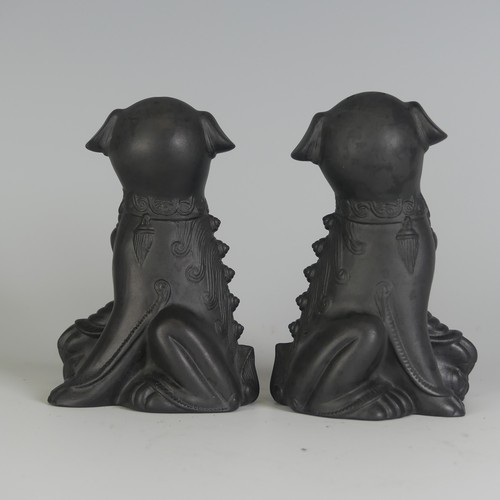 114 - A pair of Wedgwood black Basalt salt and pepper Shakers, in the form of Dogs of Foo, impressed marks... 