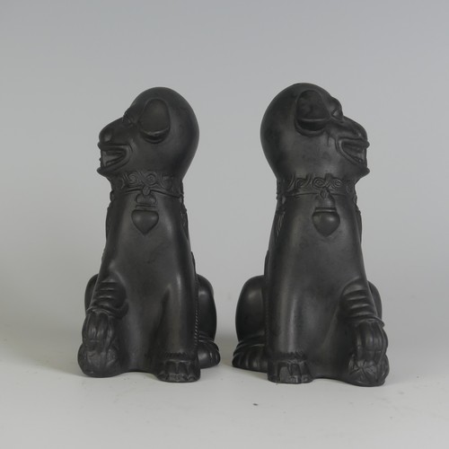 114 - A pair of Wedgwood black Basalt salt and pepper Shakers, in the form of Dogs of Foo, impressed marks... 