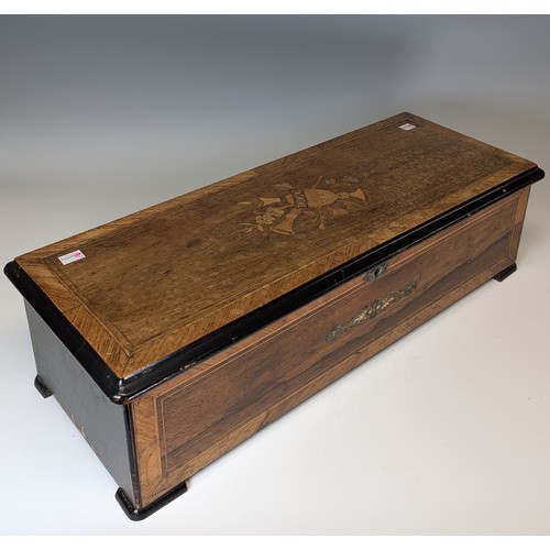 534 - A Swiss 19th century rosewood and marquetry Swiss music Box, playing twelve airs, with side ratchet ... 