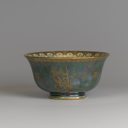 115 - Daisy Makeig-Jones for Wedgwood; a Fairyland Lustre Bowl, the exterior decorated in mottled green wi... 