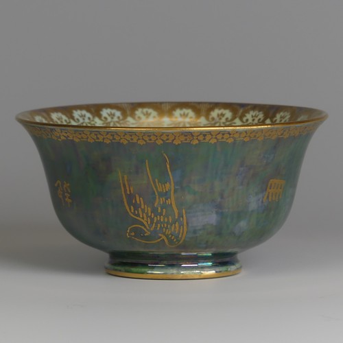 115 - Daisy Makeig-Jones for Wedgwood; a Fairyland Lustre Bowl, the exterior decorated in mottled green wi... 