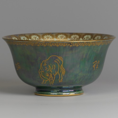 115 - Daisy Makeig-Jones for Wedgwood; a Fairyland Lustre Bowl, the exterior decorated in mottled green wi... 