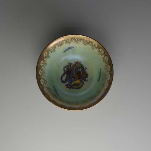 115 - Daisy Makeig-Jones for Wedgwood; a Fairyland Lustre Bowl, the exterior decorated in mottled green wi... 