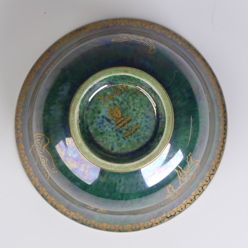 115 - Daisy Makeig-Jones for Wedgwood; a Fairyland Lustre Bowl, the exterior decorated in mottled green wi... 