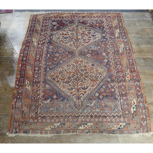 567 - Tribal Rugs; two old Caucasian rugs, 100% wool, one with stylised exotic birds, animals and flowers,... 