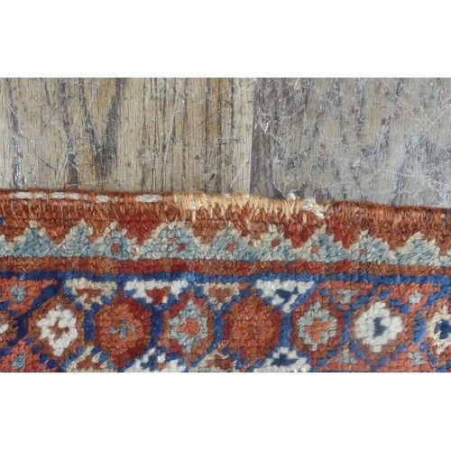 567 - Tribal Rugs; two old Caucasian rugs, 100% wool, one with stylised exotic birds, animals and flowers,... 