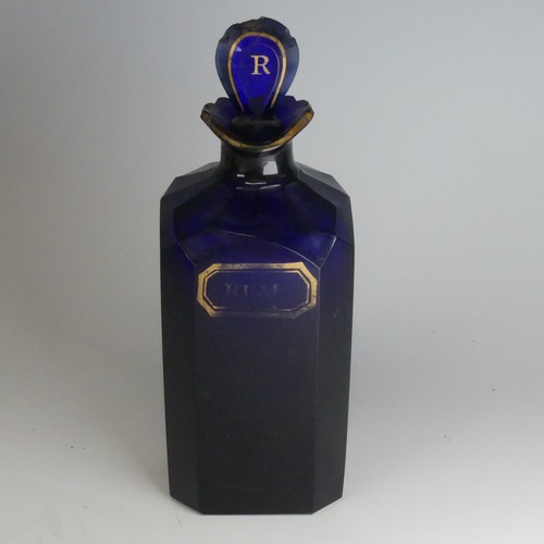 116 - A George III Bristol blue glass Rum Decanter, of chamfered square body, with titular cartouche in gi... 