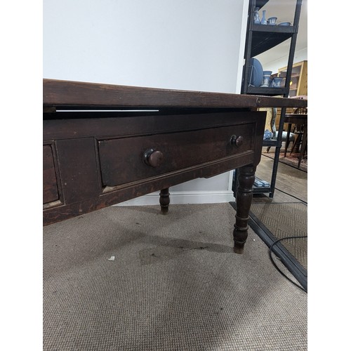 539 - A large 19th century farmhouse kitchen Table, four plank top with cleated ends, raised on later oak ... 