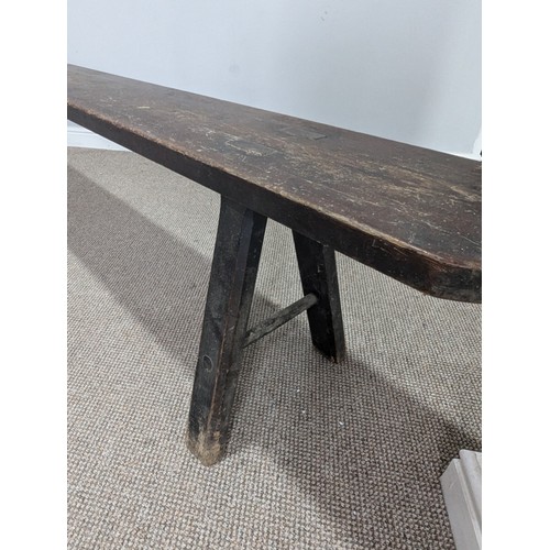 540 - A large 19th century pine joint Bench or Form, the rectangular top with rounded ends, raised on tres... 