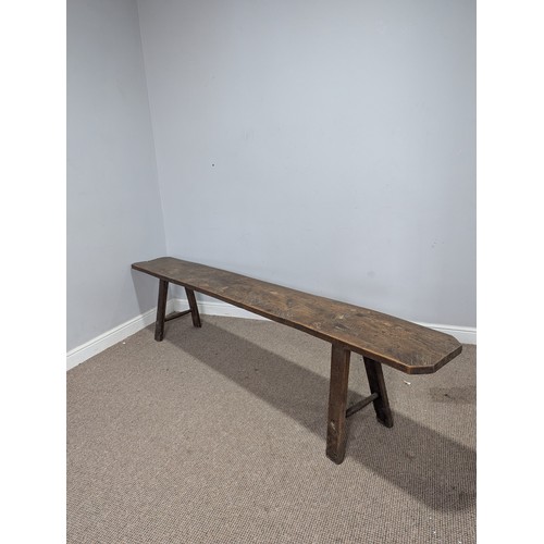 541 - A large 19th century elm joint Bench or Form, rectangular top on trestle type supports of tapering s... 