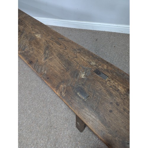 541 - A large 19th century elm joint Bench or Form, rectangular top on trestle type supports of tapering s... 