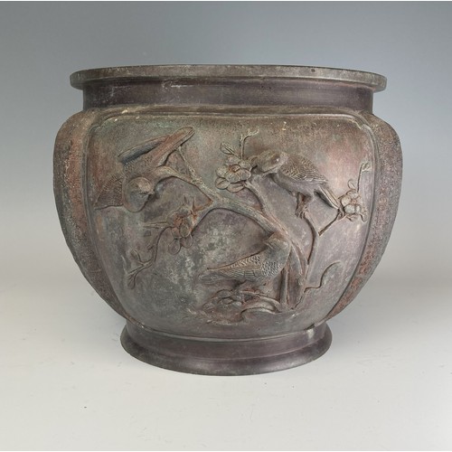 156 - A Japanese Meiji period bronze Jardinière, decorated with moulded birds in relief and pressed... 