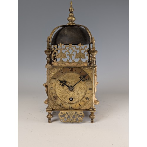 315 - An early 20th century lantern Clock, in an 18th century style, in brass case with pierced foliate mo... 