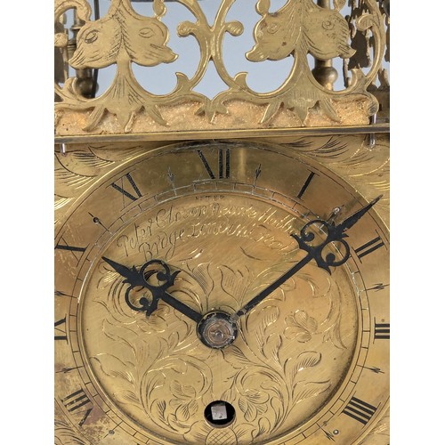 315 - An early 20th century lantern Clock, in an 18th century style, in brass case with pierced foliate mo... 