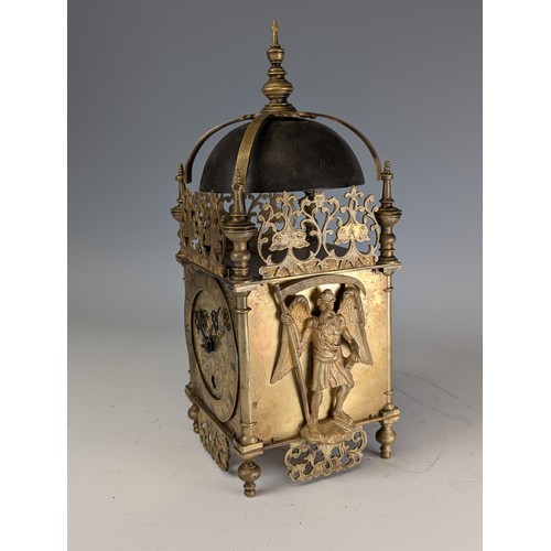 315 - An early 20th century lantern Clock, in an 18th century style, in brass case with pierced foliate mo... 