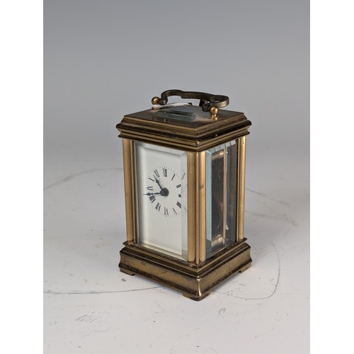 312 - An early 20th century French gilt brass miniature carriage Clock, movement stamped 'ACG' and '348', ... 