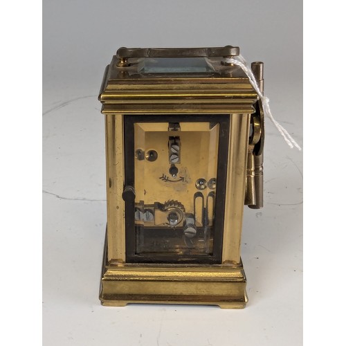 312 - An early 20th century French gilt brass miniature carriage Clock, movement stamped 'ACG' and '348', ... 