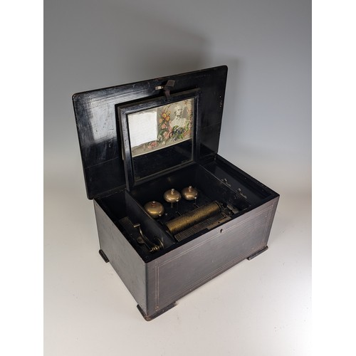 528 - A 19th century rosewood and marquetry musical Box, playing on eight airs and three bells, paper stam... 