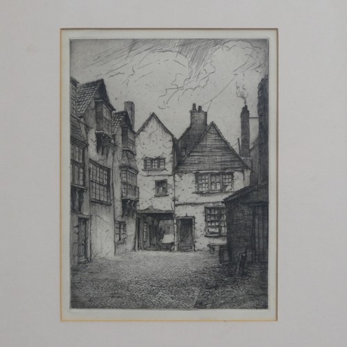 294 - F. M. Hayman (British, 20th Century), Three monochrome etchings of Exeter, circa 1925: The Elephant ... 