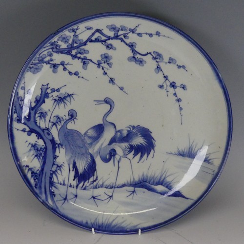 139 - A large Japanese Arita porcelain Charger, depicting cranes amongst flora, D 38.5cm, together with a ... 