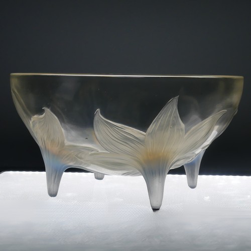 7 - An R. Lalique 'Lys' pattern opalescent glass Bowl, no. 382, raised on four stylised legs, with etche... 