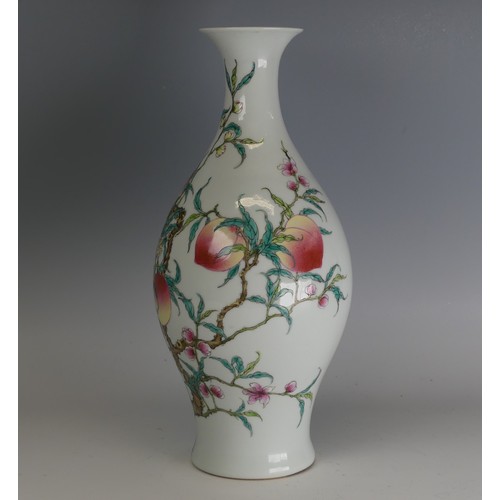 138A - A Chinese famille rose peaches Baluster Vase, well enamelled with peaches and peach blossom, ap... 